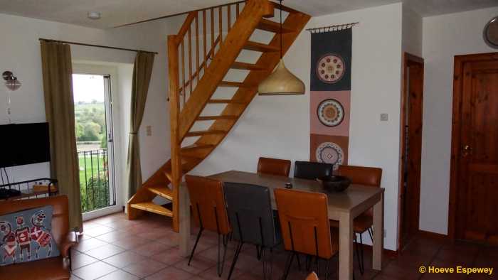 Dining area and stairs to 2nd floor